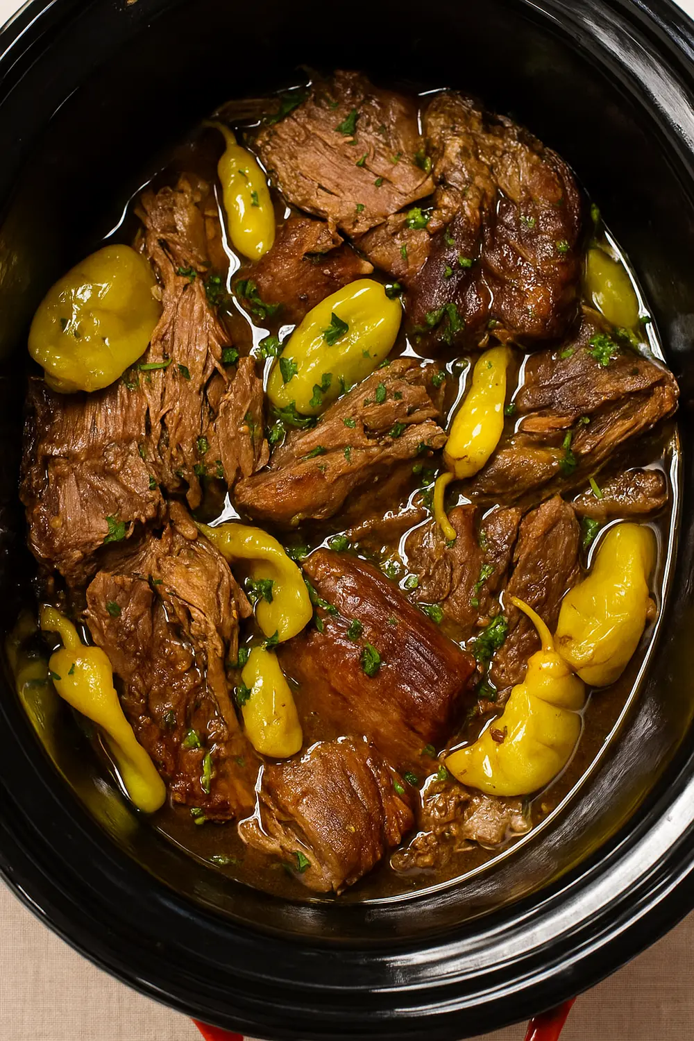 Easy Mississippi pot roast recipe made with beef, ranch seasoning, au jus, and pepperoncini for rich, savory flavor.