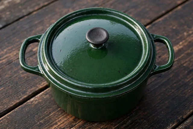 Enamel cast iron Dutch oven with lid, deep green