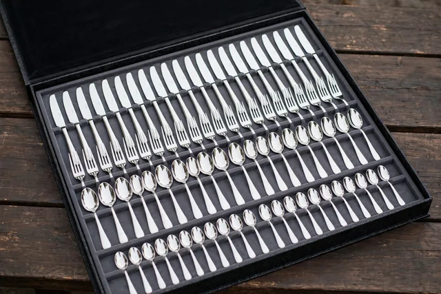 Sixty piece polished stainless silverware set